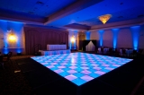 LED Dance Floor - Personalized computer controlled LED Dance Floor!  Sizes up to 23'x23'.  Multiple designs and layout arrangements.  Endless color options.  Fits any celebration.  Smooth transitions between colors.  Over 250 patterns!  Ramp system available for a total dance area of 31'x27'!  You're welcome to call 610.393.3339 for more information for visit www.RockinDanceFloor.com!